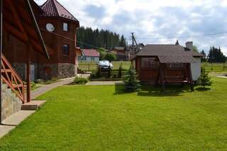 Гостевой дом Aura Karpat Буковель Дом с 4 спальнями-2